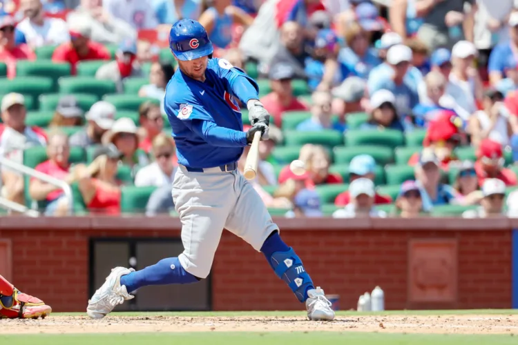 Cubs take care of Cardinals in extra innings